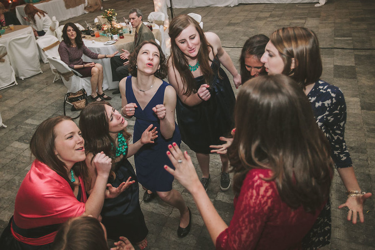 Wedding guests passionately singing one last song.