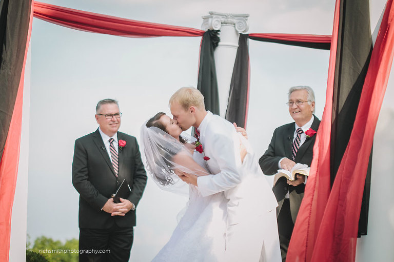 Bride and groom kiss for the first time as husband and wife!