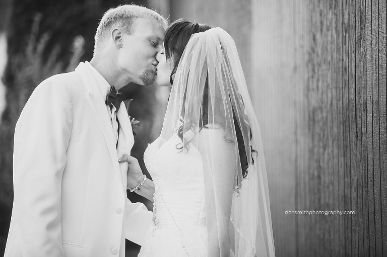Bride and groom kiss on their wedding day near Birmingham, Alabama.