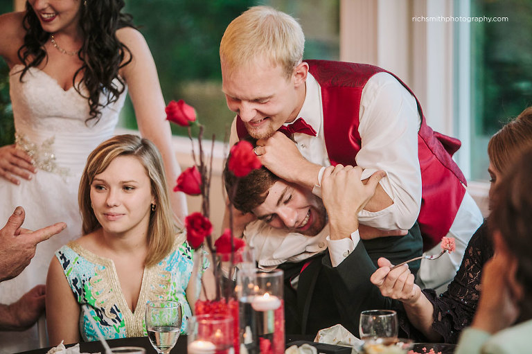 Groom messes up his brother hair on his wedding day.