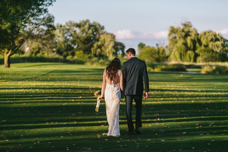 bride and groom, wedding day, golf course, walking