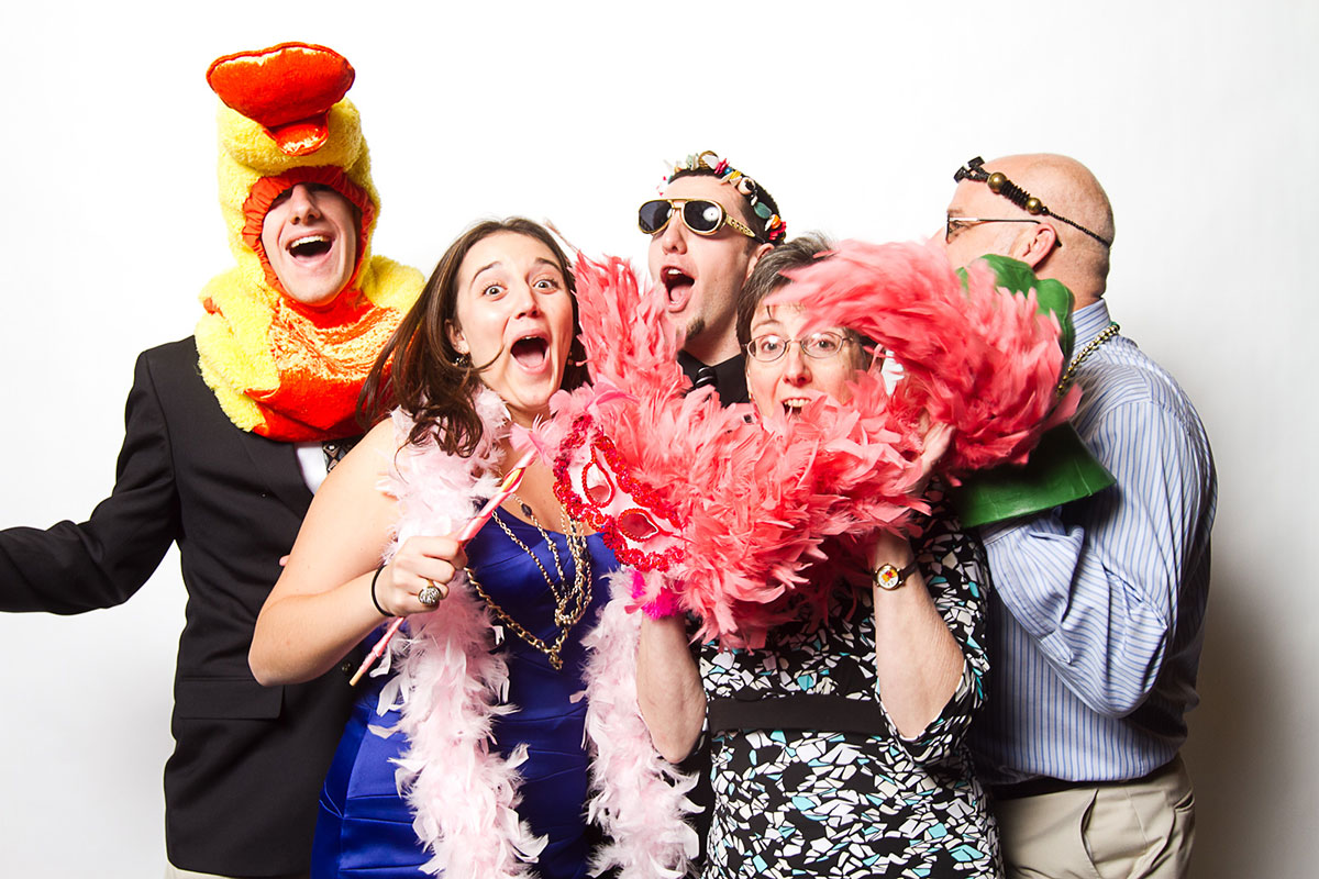 wedding guests going wild in photo booth