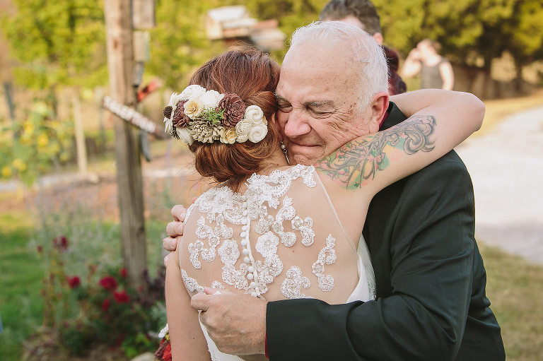 bride with grandfather, hugging, wedding day, barn wedding