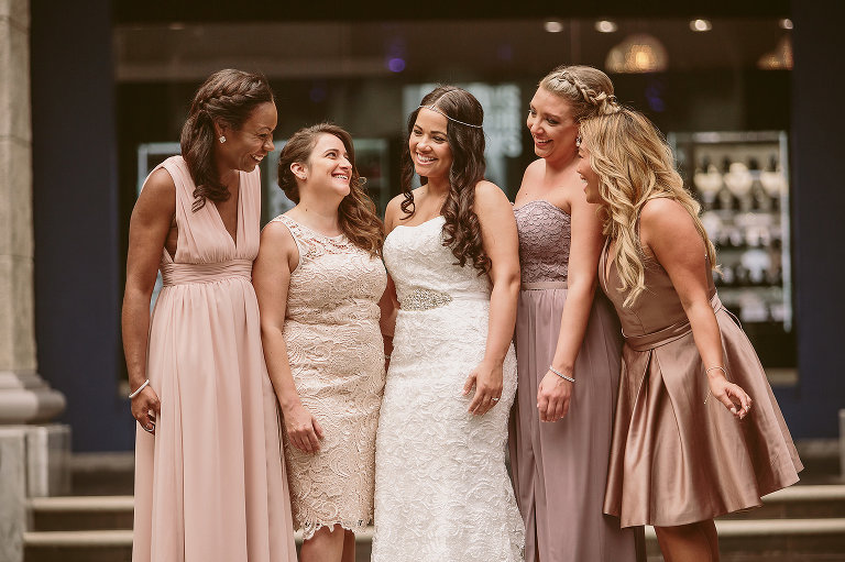 bride and bridesmaids in the lobby of the hard rock hotel riviera maya Mexico