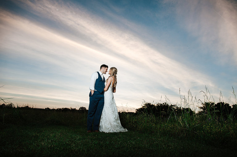 bride and groom sunset portrait 