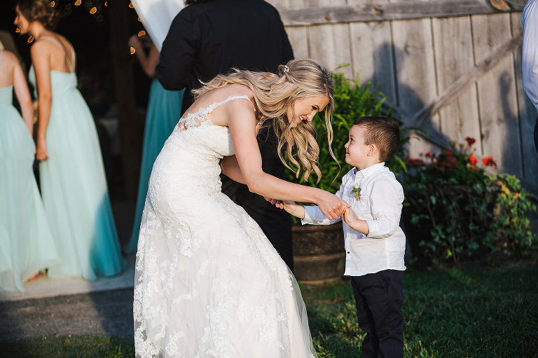 bride dancing with ring bearer