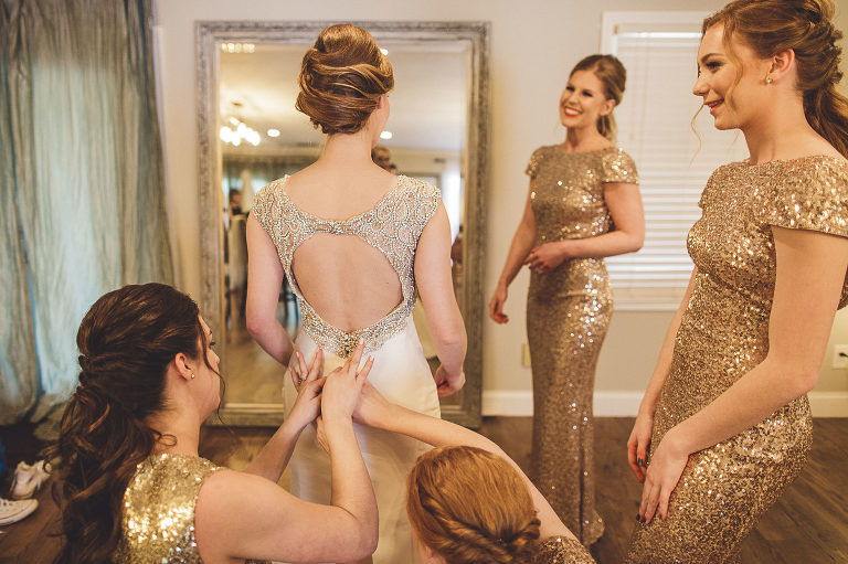 bride and bridesmaids getting ready 