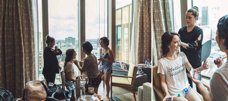 bride getting ready in hotel with bridesmaids