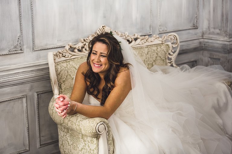 bride hanging out on a antique couch