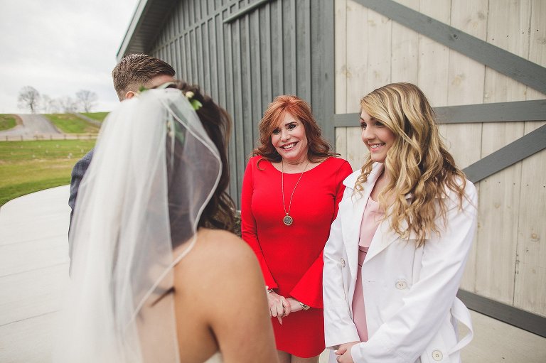 bride greets guests after ceremony