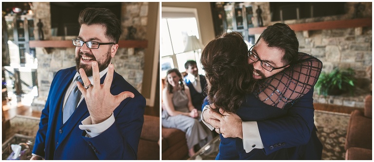groom showing his new wedding ring and hugging his mom