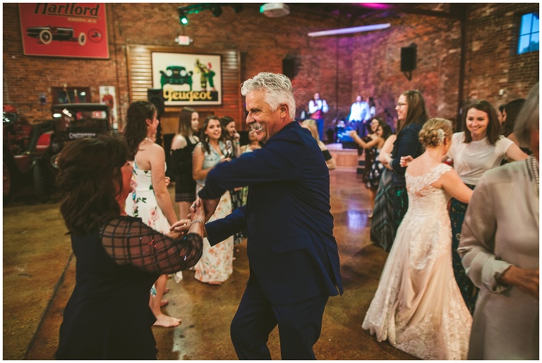 grooms parents dancing at reception 