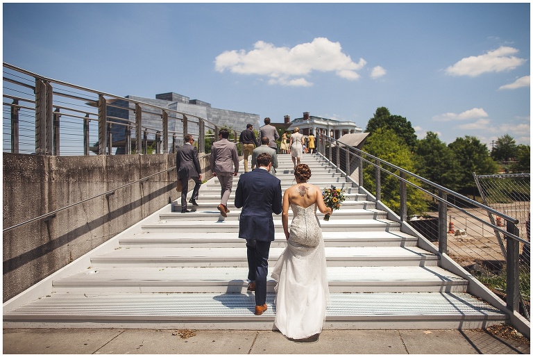 bride and groom on glass bridge downtown chattanooga 