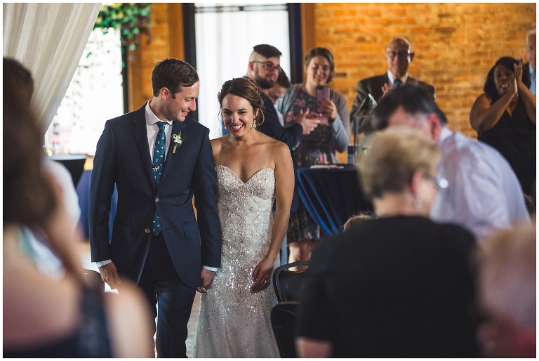 bride and groom introduced into reception 