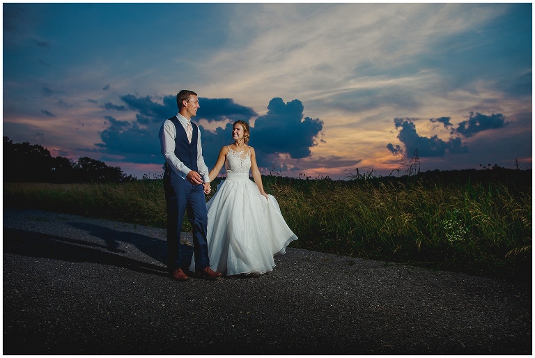 bride and groom at sunset 