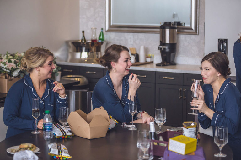 bridesmaids laughing together