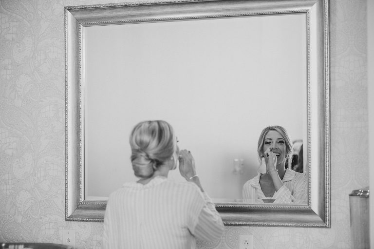 bride brushing teeth and getting ready