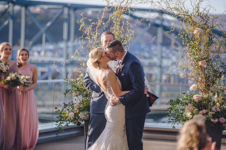 bride and groom kiss
