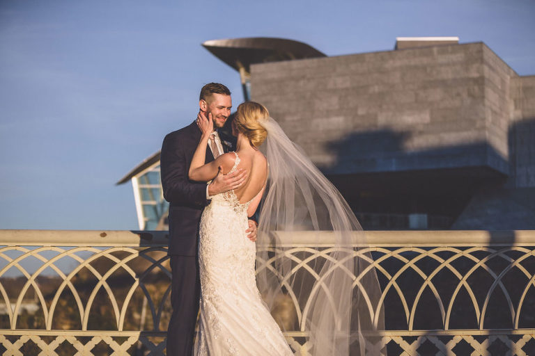 bride and groom walking bridge chattanooga