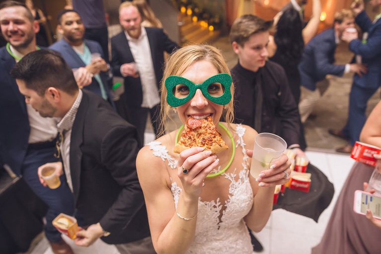 bride with glasses, pizza, and glow sticks