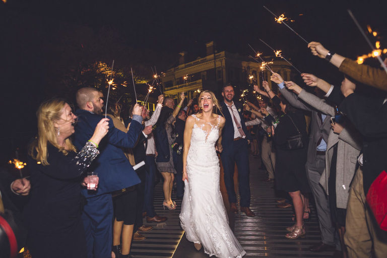bride and groom exit with sparklers