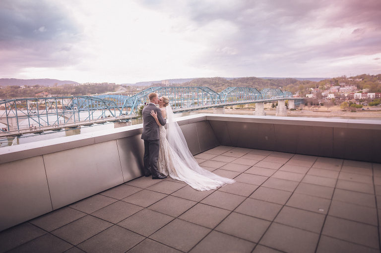 bride and groom on rooftop at the hunter museum after wedding ceremony 