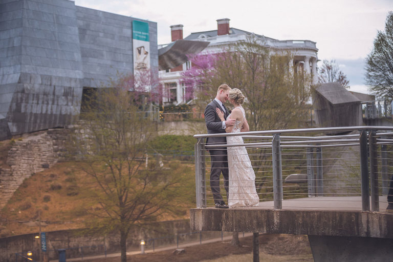 bride and groom with hunter museum in background